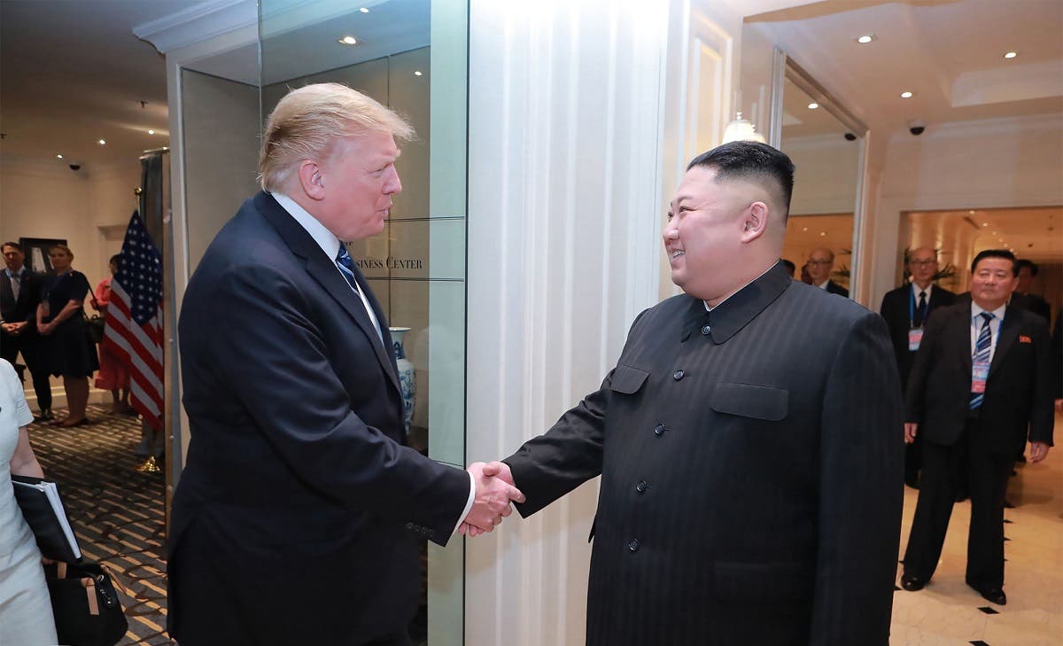 Kim Jong Un (L) with US President Donald Trump at the Sofitel Legend Metropole hotel in Hanoi. (AFP)
