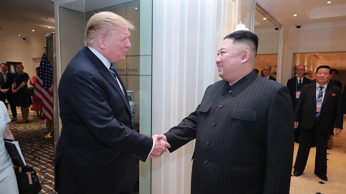 Kim Jong Un (L) sitting with US President Donald Trump at the Sofitel Legend Metropole hotel in Hanoi. (AFP)