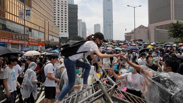 Protestors gather near the Legislative Council in Hong Kong, Wednesday, June 12, 2019. (AP) (correct)