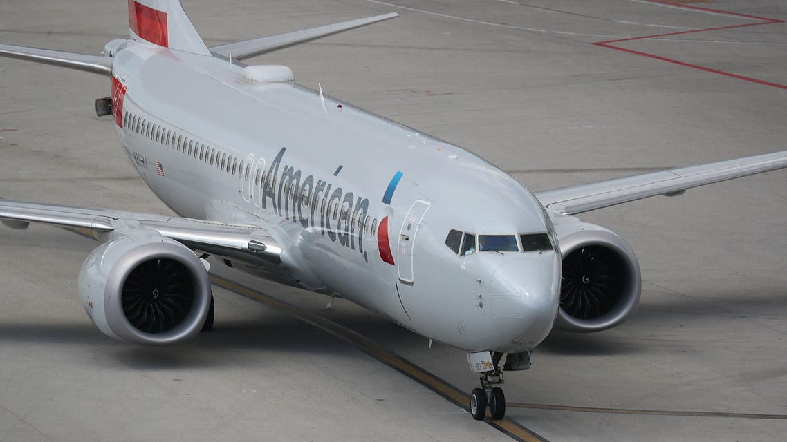 An American Airlines Boeing 737 Max 8 taxis to its gate at the Miami International Airport on March 12, 2019. (AFP)