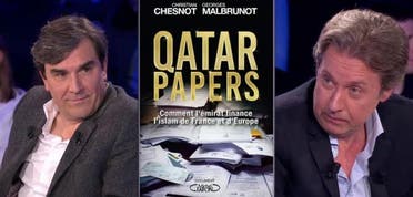 File photo shows French journalists Christian Chesnot and Georges Malbrunot and their book: The Qatar Papers – How the Emirate Finances Islam in France and Europe. (File photo)