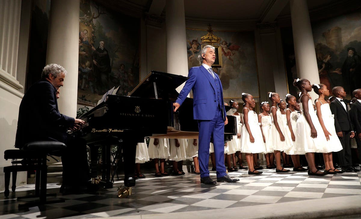 Tenor Andrea Bocelli and composer Nicola Piovani, (left), perform during the concert that inaugurates the Franco Zeffirelli International Center For Performing Arts, in Florence, Italy, on July 31, 2017. (AP)
