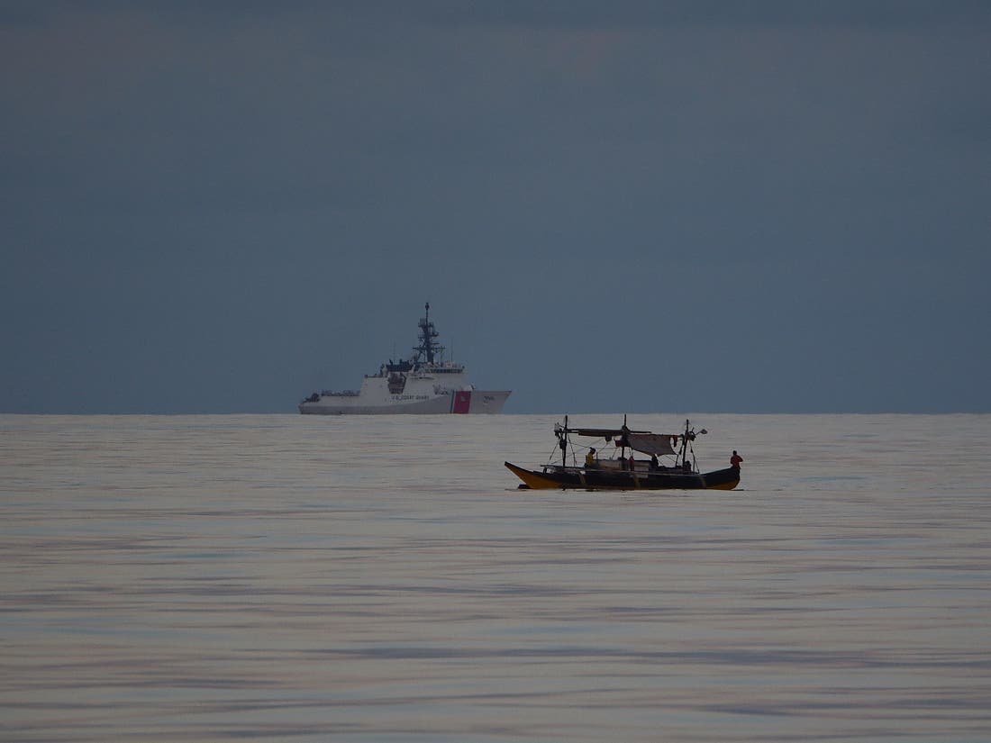 Philippines says a coast guard ship and supply boat were rammed by