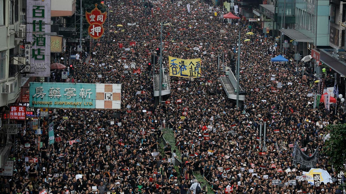 Tens of thousands of protesters march through the streets as they continue to protest an extradition bill in Hong Kong on June 16, 2019. (AP)