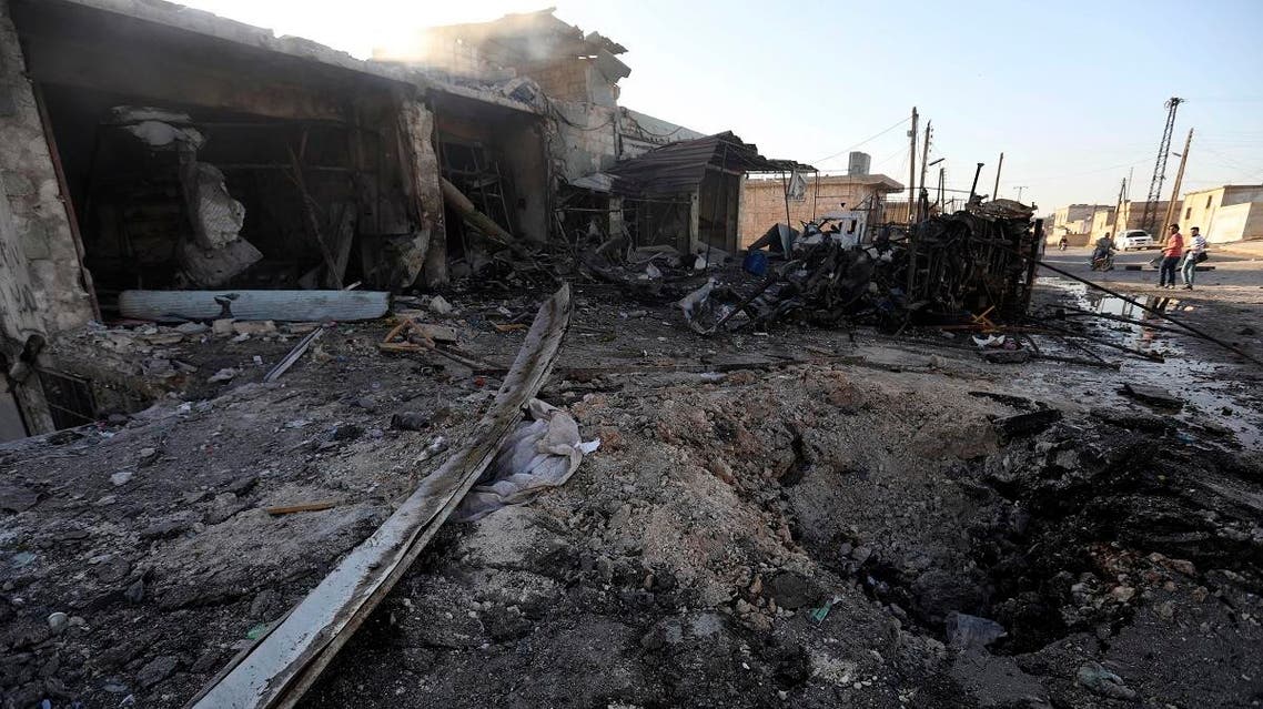 A picture taken on May 28, 2019, shows the site of regime bombardment on the village of Kafr Halab, on the western edge of Aleppo province. At least 21 civilians were killed on Tuesday as Syria's regime intensified its bombardment of the last jihadist stronghold in the country's northwest, a monitor said. OMAR HAJ KADOUR / AFP