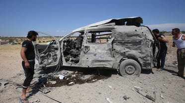 A destroyed ambulance is pictured after it was targeted in a reported regime air strike in the town of Maaret al-Numan in northwest Syria on June 20, 2019. (AFP)
