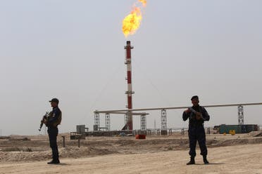 Members of the oil police guard near the West Qurna-1 oilfield, which is operated by ExxonMobil, near Basra, Iraq May 20, 2019. (Reuters)