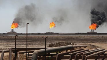 Flames emerge from the flare stacks at the West Qurna-1 oilfield, which is operated by ExxonMobil, near Basra, Iraq June 1, 2019. (Reuters)