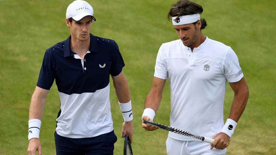 Andy Murray and Feliciano Lopez during their round of 16 doubles match against Juan Sebastian Cabal and Robert Farah at the first-round doubles win at the Queen’s Club championships on June 20, 2019. (Reuters)