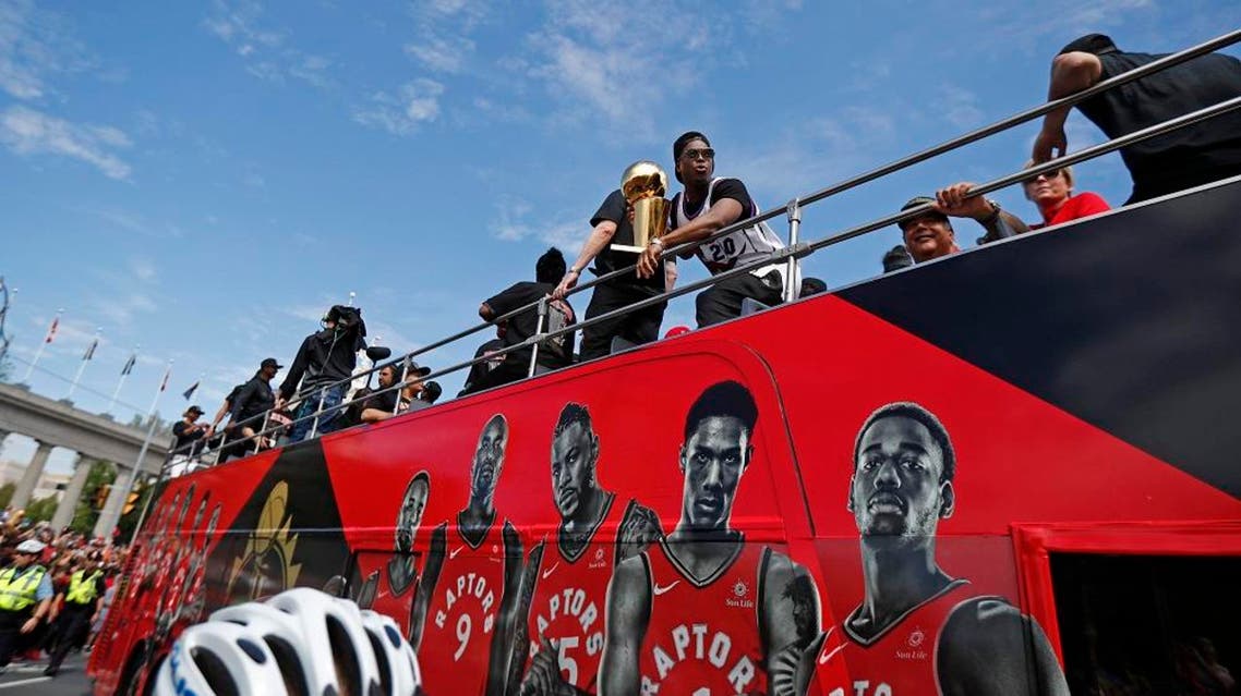 Kyle Lowry #7 of the Toronto Raptors holds the Larry O'Brien Championship Trophy. (File photo: AFP)