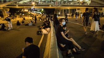 Hong Kong protesters disperse after blockading police headquarters