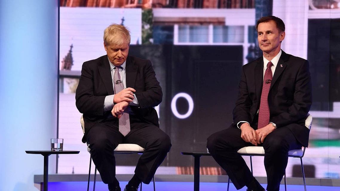 Boris Johnson and Jeremy Hunt appear on BBC TV's debate with candidates vying to replace British PM Theresa May. (Reuters)