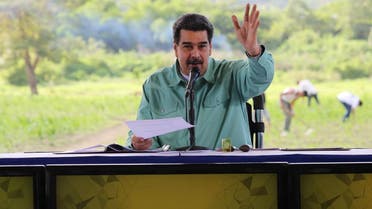 Venezuela's President Nicolas Maduro gestures while he speaks during a meeting with representatives of the agricultural sector in La Victoria. (Reuters)