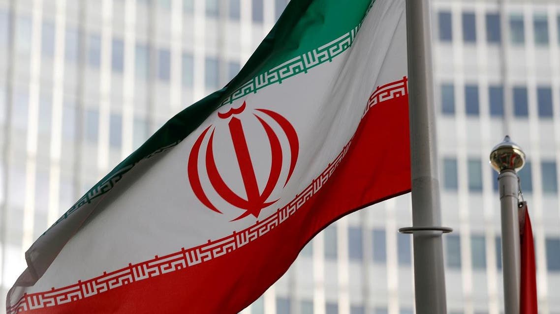 The Iranian flag flutters in front the International Atomic Energy Agency headquarters in Vienna, Austria. Reuters)