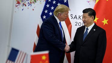 China's President Xi Jinping (R) greets US President Donald Trump before a bilateral meeting on the sidelines of the G20 Summit in Osaka on June 29, 2019. (AFP)