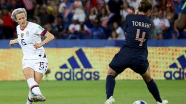 Megan Rapinoe  (left), on her way to scoring her side’s second goal during the Women’s World Cup quarterfinal soccer match between France and the US at the Parc des Princes, in Paris, on  June 28, 2019. (AP)