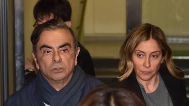 Carlos Ghosn and wife AFP