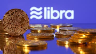 Representations of virtual currency are displayed in front of the Libra logo in this illustration picture, on June 21, 2019. (Reuters)