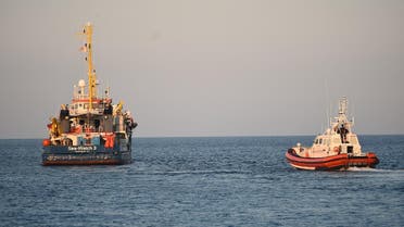 the Sea-Watch 3 rescue ship leaves after migrants disembark in Lampedusa. (AP)