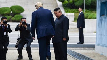 US President Donald Trump meets with North Korean leader Kim Jong Un at the DMZ separating the two Koreas, in Panmunjom. (AFP)