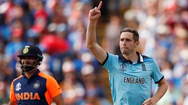 England’s Chris Woakes celebrates after taking the wicket of India’s Rohit Sharma during the ICC Cricket World Cup group match at Edgbaston, Birmingham, Britain, on June 30, 2019. (Reuters)