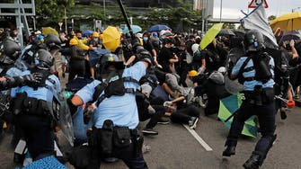 Hong Kong on edge as protests erupt ahead of handover rally