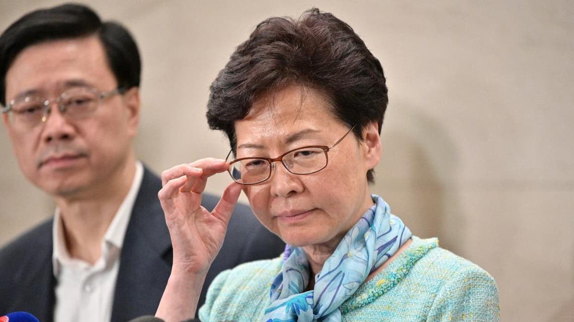 Lam speaks to the media at the police headquarters in Hong Kong early on July 2, 2019. (AFP)