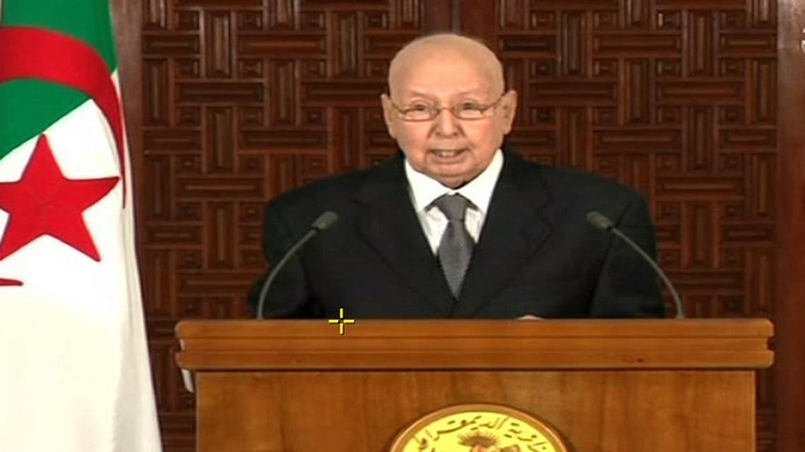 An image grab from the Algerian national television chanel on July 3, 2019, shows Algerian interim President Abdelkader Bensalah addressing the nation. (AFP)