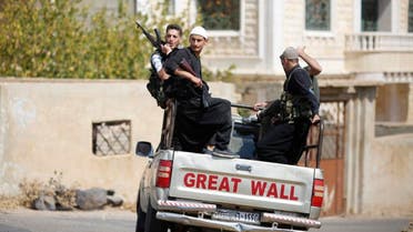 In this Thursday, Oct. 4, 2018, photo, young Druze armed men, patrol the village of Rami in the southern province of Sweida, Syria. AP