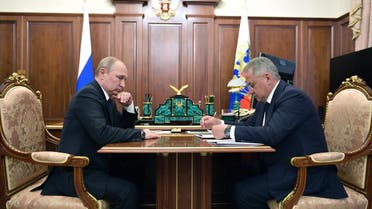 President Vladimir Putin (L) meets with Russian Defence Minister Sergei Shoigu in Moscow on July 2, 2019. Fourteen Russian seamen have died in a fire on a deep-water research submersible, Russia's defence ministry said on July 2, 2019. (AFP)