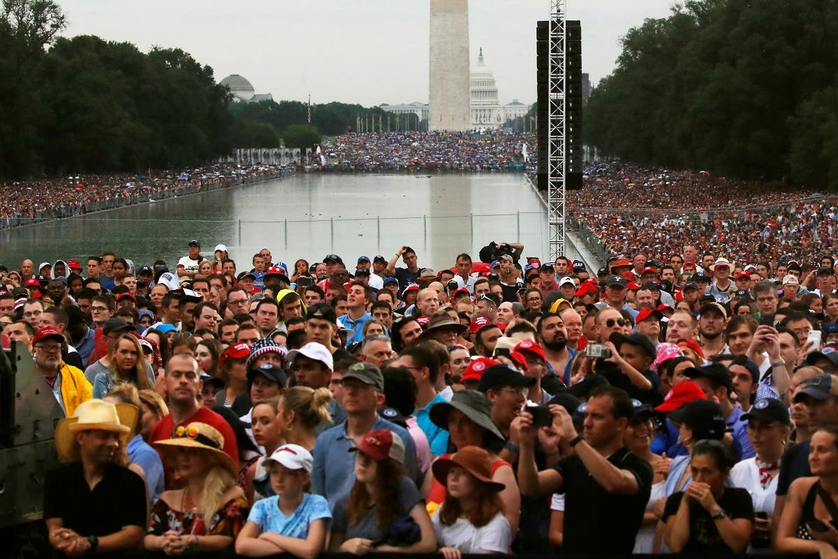 Attendees listen as US President Donald Trump addresses the “Salute to America” event during Fourth of July Independence Day celebrations at the Lincoln Memorial in Washington, D.C., US, on July 4, 2019. (Reuters)