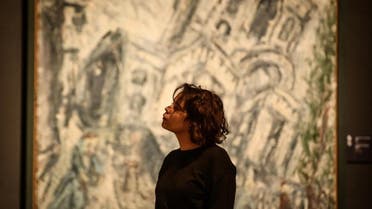A visitor stands in front of "Christ Church, Spitalfields, Morning" by British painter Leon Kossoff AFP
