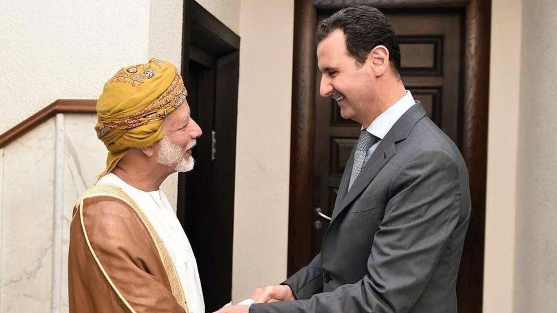 A handout picture released by the official Syrian Arab News Agency (SANA) shows Syrian President Bashar al-Assad (R) receiving Oman’s Minister of Foreign Affairs Yussef bin Alawi bin Abdullah in Damascus on October 26, 2015. (AFP)