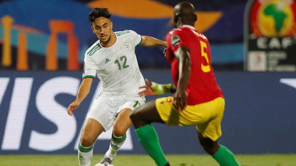 Algeria’s Adam Ounas in action with Guinea’s Ernest Seka in the Africa Cup of Nations 2019 Round of 16 on July 7, 2019. (Reuters)