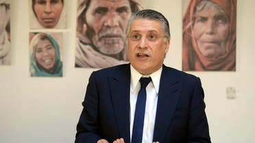 Tunisian presidential candidate Nabil Karoui speaks during an interview with AFP at his office in Tunis on June 18, 2019. (AFP)