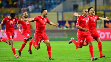 Tunisia's players celebrate their win during the 2019 Africa Cup of Nations (CAN) Round of 16 football match between Ghana and Tunisia at the Ismailia Stadium in the Egyptian city on July 8, 2019. (AFP)