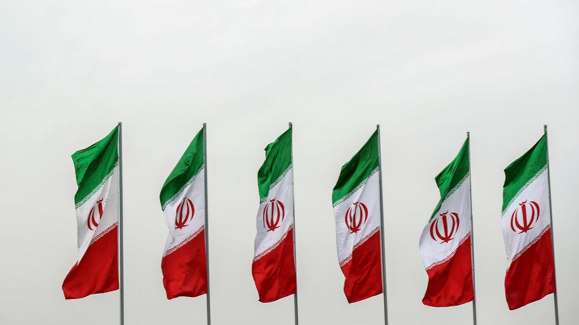 Iran flags - Iranian Presidency Office via AP