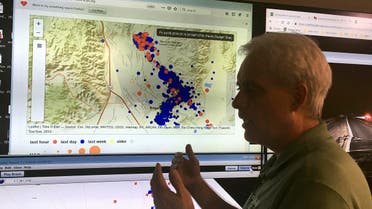 Robert Graves, a seismologist from the US Geological Survey, stands in front of a display of earthquakes in Searles Valley during a news conference  on July 5. (AP)