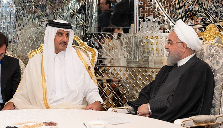 الرئيس الأغيراني حسن روحاني وأمير قطر الشيخ تميم