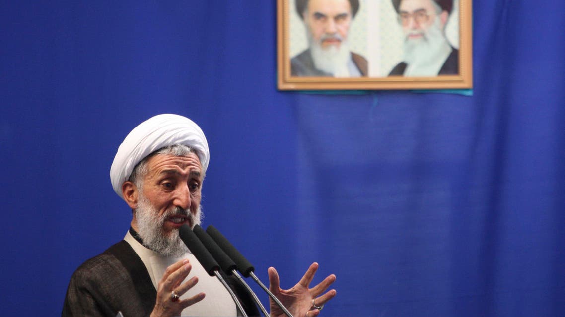 Senior Iranian cleric Hojatoleslam Kazem Sedighi, delivers a Friday prayer sermon, in front of portraits of the late revolutionary founder Ayatollah Khomeini, left, and supreme leader Ayatollah Ali Khamenei, at the Tehran University campus in Tehran, Iran, Friday, July 16, 2010. (AP)