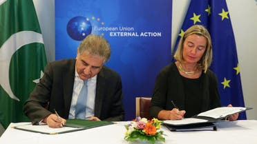 Pakistan’s Foreign Affairs Minister Shah Mehmood Qureshi (left) along with European Commission’s Federica Mogherini sign the EU-Pakistan Strategic Engagement Plan in Brussels, on June 25, 2019.  (AFP)