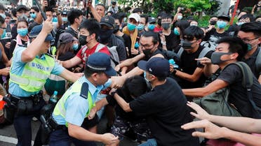 Police try to disperse pro-democracy activists after a march at Sheung Shui, a city border town in Hong Kong, on July 13, 2019. (Reuters)