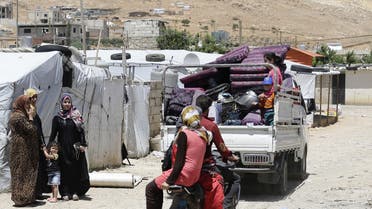 A picture taken on June 10, 2019, shows a Syrian refugee camp in the northeastern town of Arsal in Lebanon's Bekaa valley. Lebanon's planned demolition of concrete shelters housing Syrian refugees near the border could make at least 15,000 children homeless, aid groups warned Tuesday. The authorities in April set a June 9 deadline for Syrian refugees living in shelters built with materials other than timber and plastic sheeting in Arsal to bring their homes into compliance.
