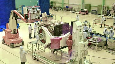 Indian Space Research Organisation (ISRO) scientists work on the orbiter vehicle of ‘Chandrayaan-2,’ India’s first moon lander and rover mission planned and developed by the ISRO, in Bangalore. (AFP)