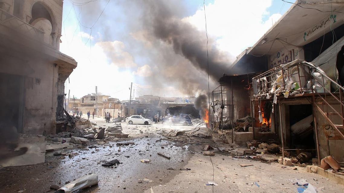 Smoke billows following an airstrike by Syrian regime forces in Maar Shurin on the outskirts of Maaret al-Numan in northwest Syria. (AFP)