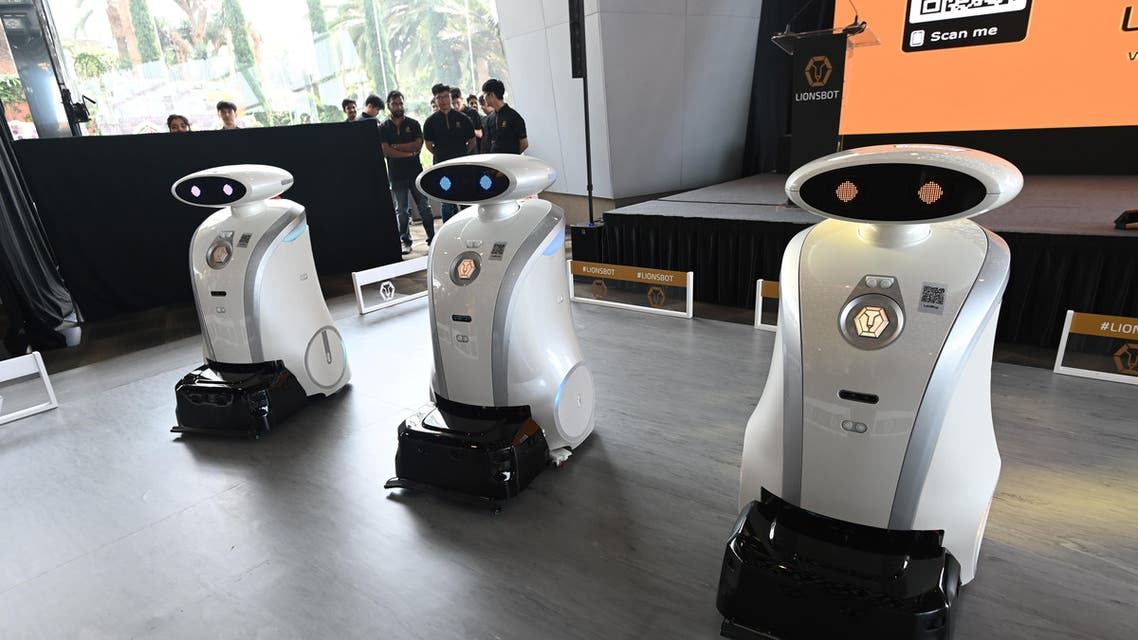 Autonomous cleaning robots are seen during a launch in Singapore on July 17, 2019. (AFP)