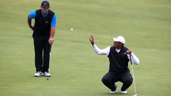 Tiger Woods to miss cut despite improved round at British Open