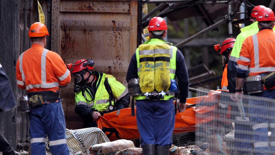 Rescue workers enter the Pike River mine at Greymouth, New Zealand, Tuesday, June 28, 2011 (AP)