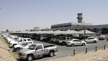 Cars are parked outside the Abha airport in the southern Saudi Arabian popular mountain resort of the same name, on July 2, 2019. A Yemeni rebel attack on the civilian airport wounded nine civilians today, a Riyadh-led coalition said, the latest in a series of strikes on the site. AFP