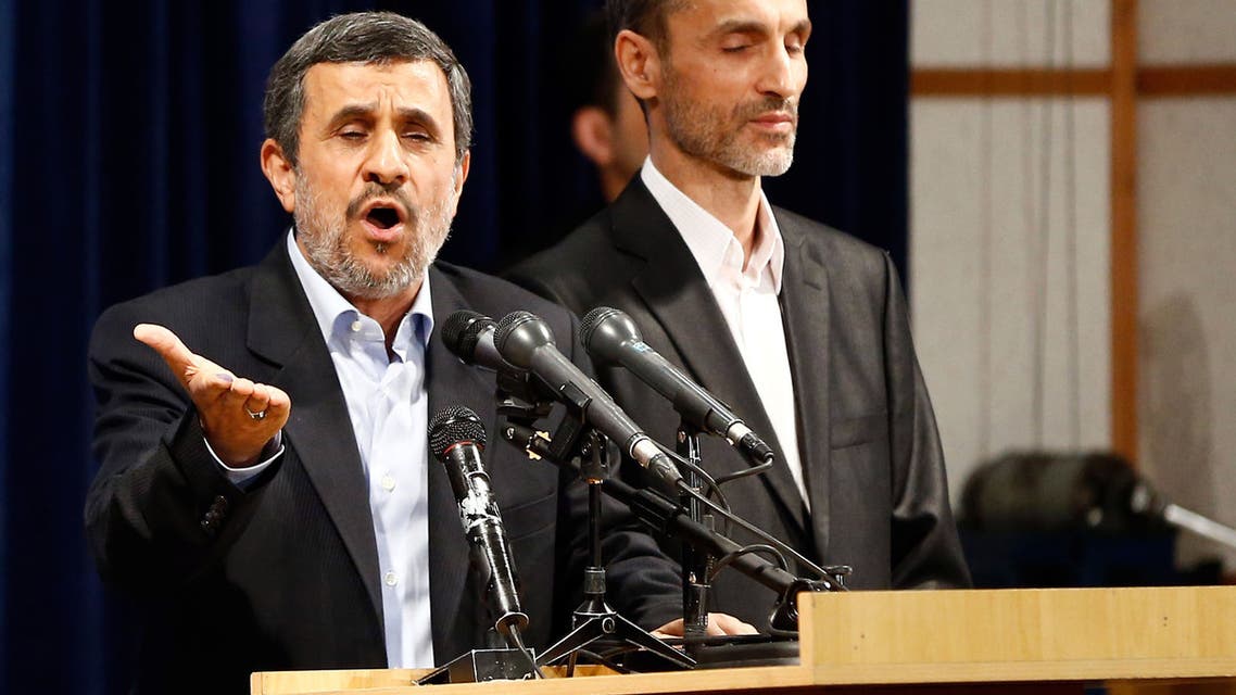 Former Iranian president Mahmoud Ahmadinejad (L) speaks, as he is accompanied by former Iranian Vice President Hamid Baghaei, after registering at the Interior Ministry's election headquarters as candidates begin to sign up for the upcoming presidential elections in Tehran on April 12, 2017. Ahmadinejad had previously said he would not stand after being advised not to by supreme leader Ayatollah Ali Khamenei, saying he would instead support his former deputy Hamid Baghaie who also registered on Wednesday.